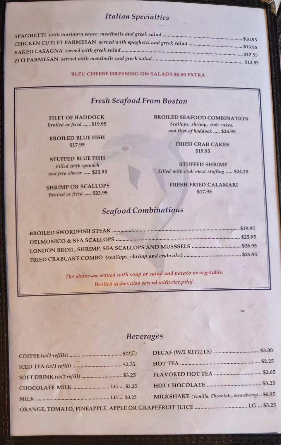 Close-up of a diner menu with fried haddock listed.